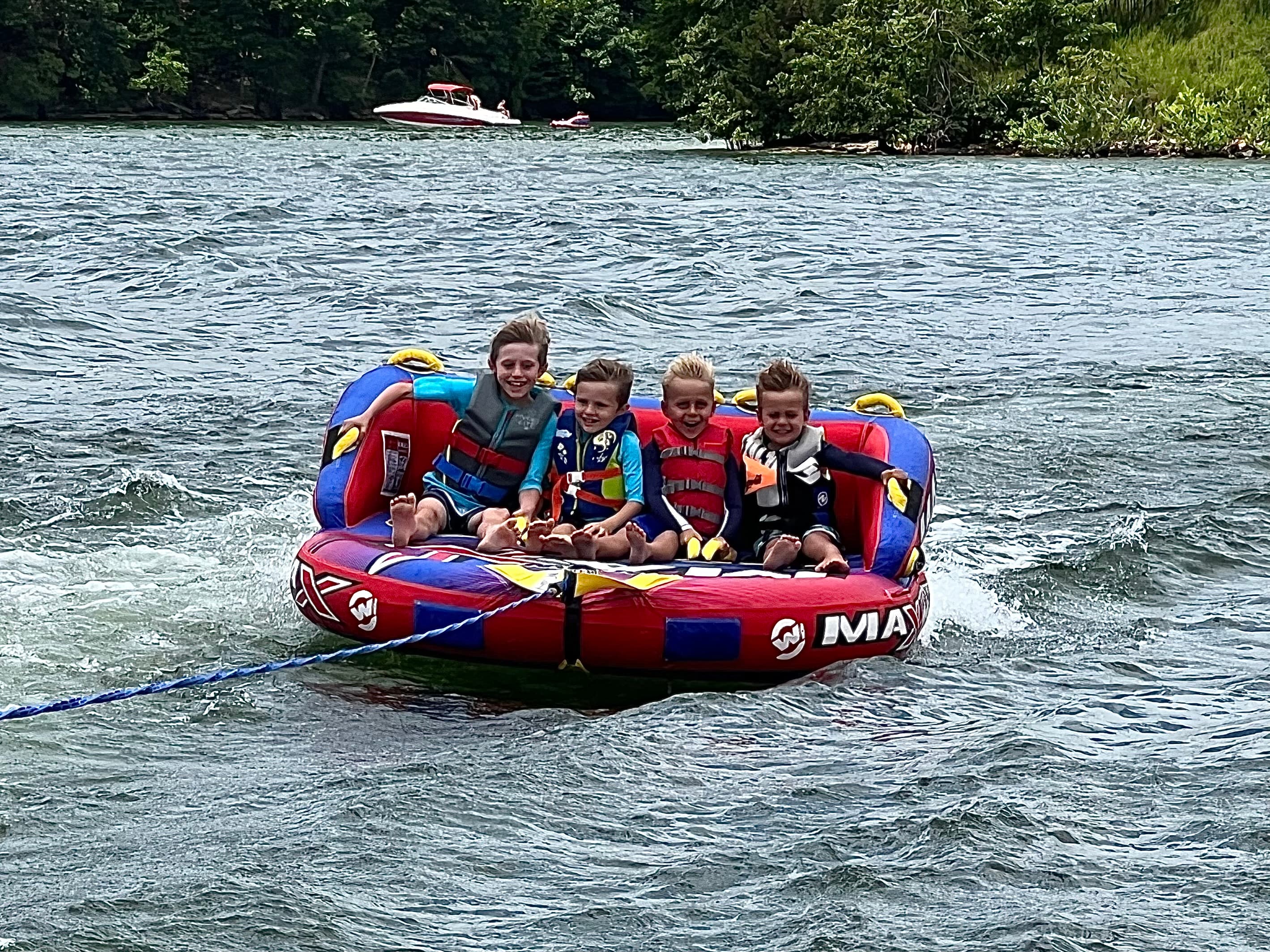 Kids tubing on Beaver Lake near Rogers