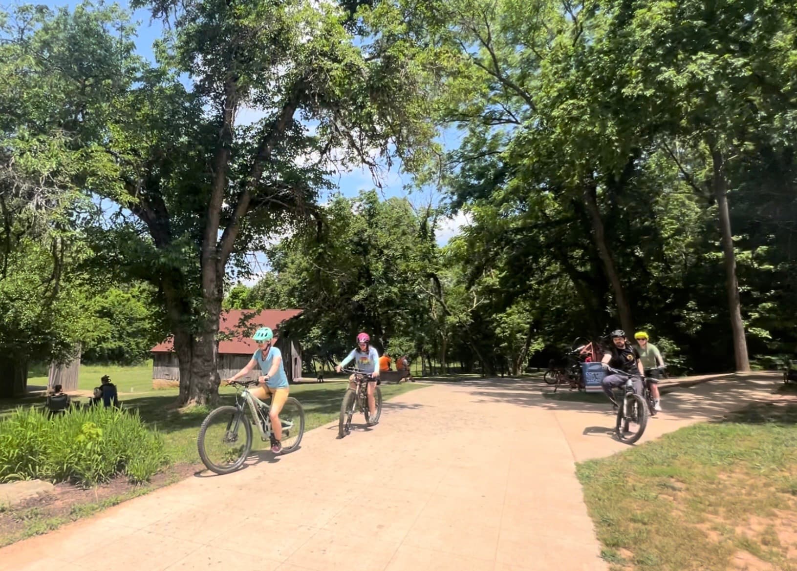 Cyclists riding through Coler Preserve in Bentonville